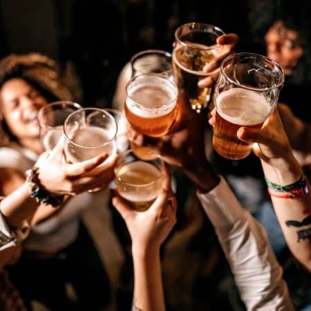 Cheers your beers on a pub crawl with your new drinking mates